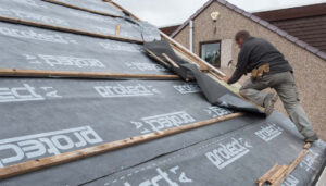 High quality tradesman fitting slate roof in Aberdeen