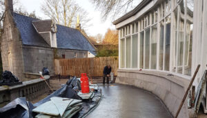Man fitting flat roof in Aberdeen