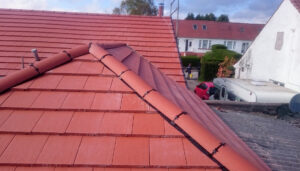 New red tiled roof on semi-detached house Aberdeen