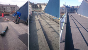 Man working on fitting a new felt roof on high building